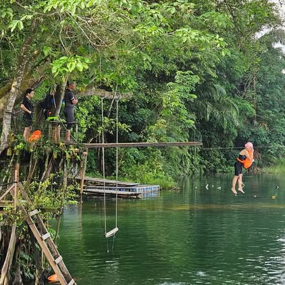 Jungle zipline crossing over the river