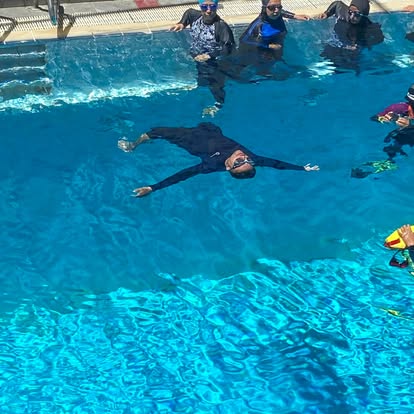 Back-float practice in the deep pool