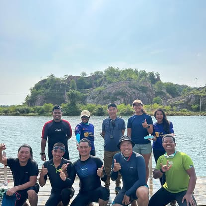 Team group photo on the quarry lake deck