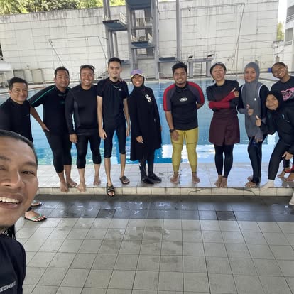 Team at pool training session